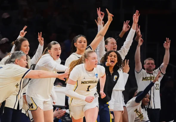 Olivia Olson et Syla Swords mènent le Michigan à une