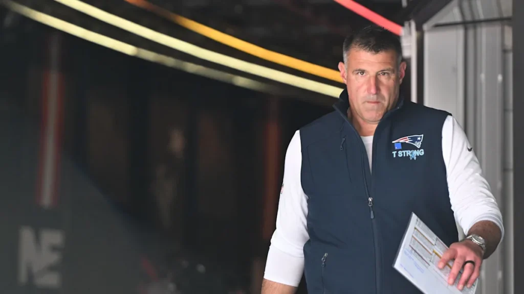 Pablo Torre suit Mike Vrabel et Dianna Russini