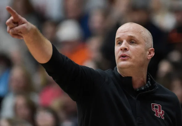 L'ancien Wall prend sa retraite en tant qu'entraîneur de basket-ball